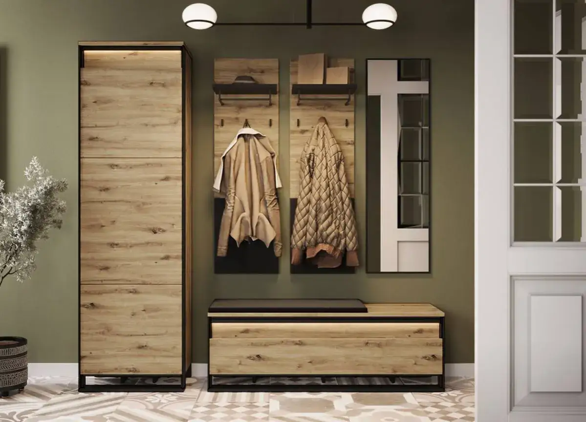 Aménagement placard entrée moderne avec armoire, banc de rangement, patères pour manteaux et miroir.